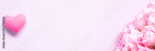 Top flat lay decoration valentine day concept heart rose flower pink background with copy space.