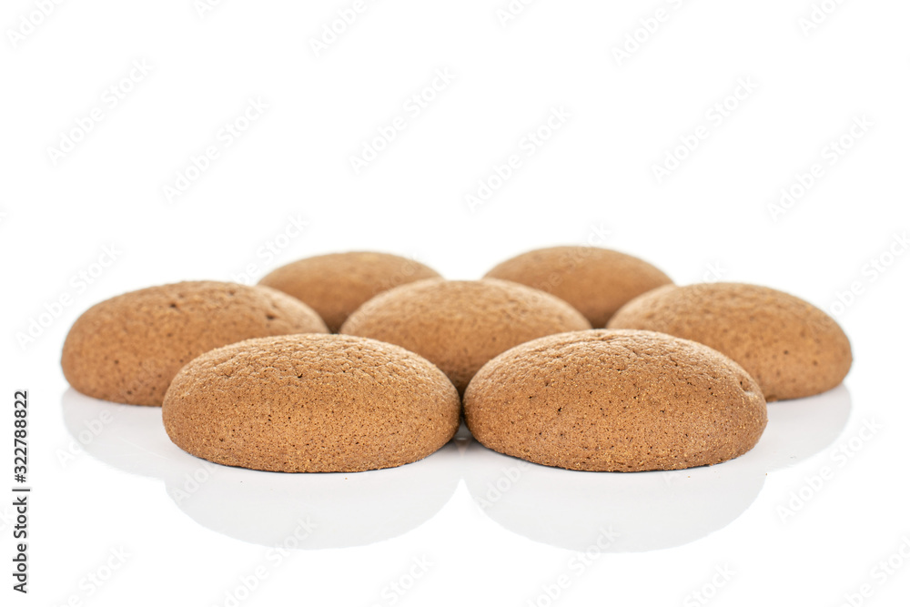 Group of seven whole sweet brown chocolate sponge biscuit isolated on white background Group of seven whole sweet brown chocolate sponge biscuit isolated on white background