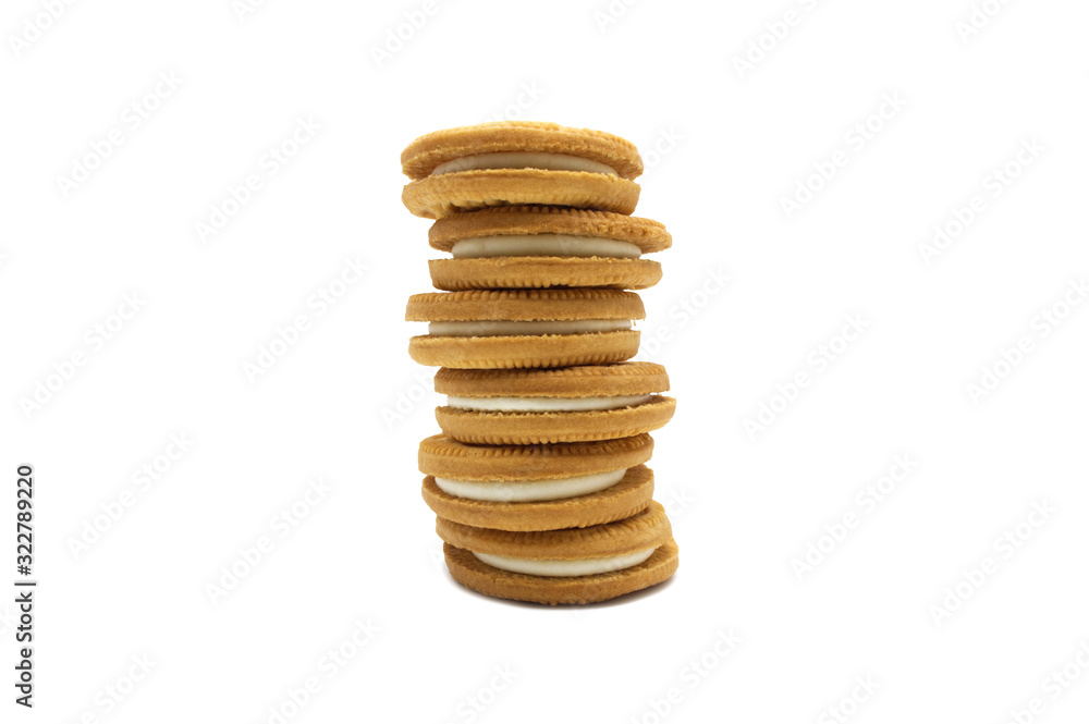Stack of sandwich cookies milk flavoured cream isolated on white background. Stack of sandwich cookies milk flavoured cream isolated on white background.