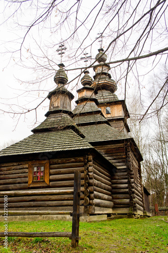 Old rural wooden church. Background for religion. Background for the construction of natural materials. © Pavlo