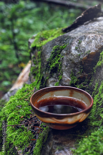 Puer cup in the forest