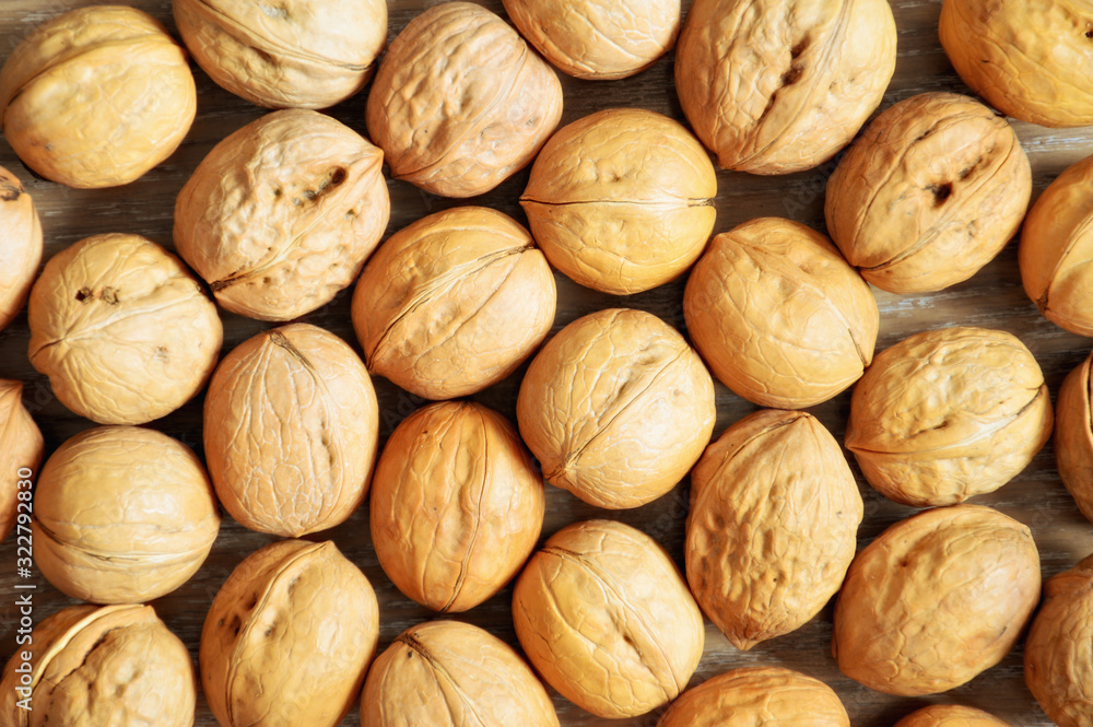 Walnut. proper nutrition, nut in the shell. background for design. background, screen saver. photo of food. Walnut. proper nutrition, nut in the shell. background for design. background, screen saver. photo of food.