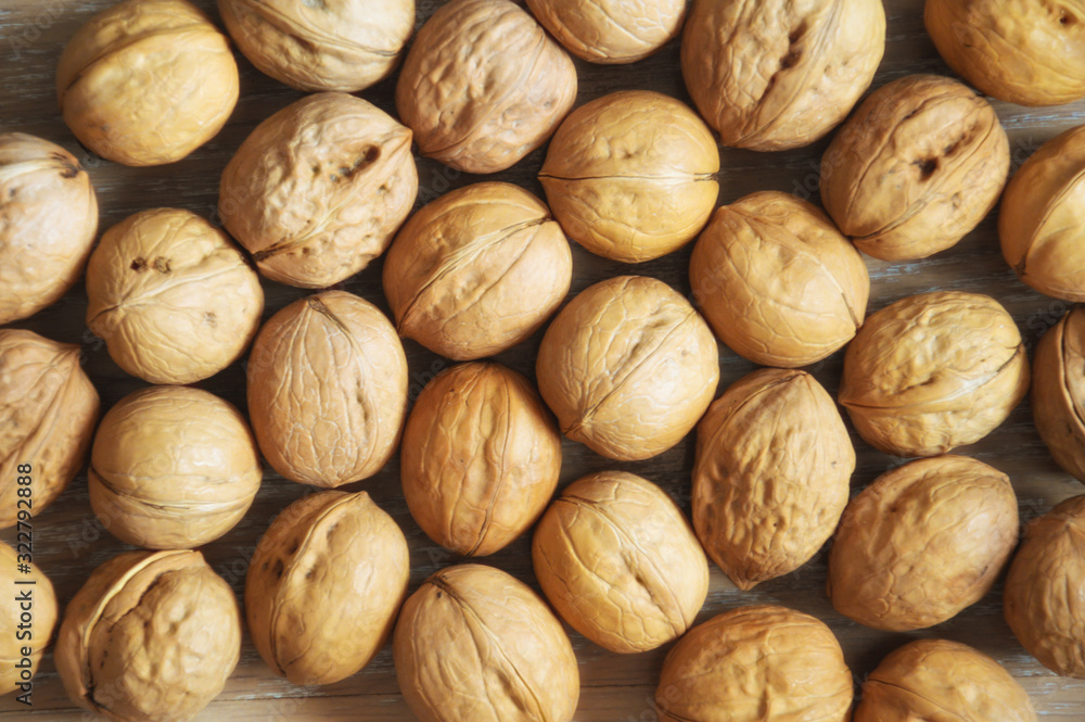 Walnut. proper nutrition, nut in the shell. background for design. background, screen saver. photo of food. Walnut. proper nutrition, nut in the shell. background for design. background, screen saver. photo of food.