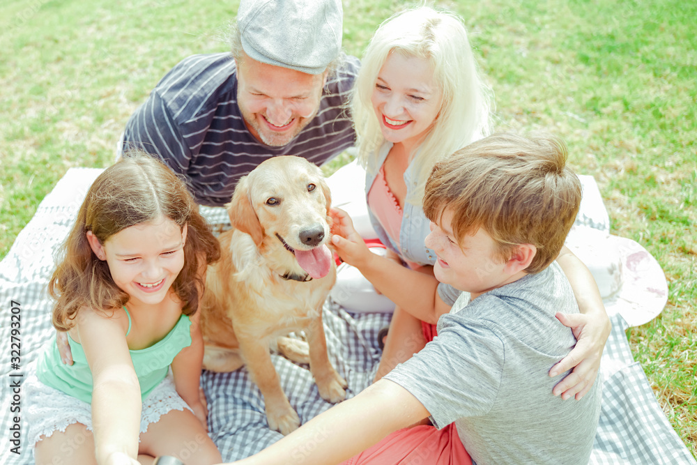 Happy family making a selfie, for the dog is not very important. Parents and children having fun in the holiday. Travel , holidays and love concept. Focus on the dog - Image Happy family making a selfie, for the dog is not very important. Parents and children having fun in the holiday. Travel , holidays and love concept. Focus on the dog - Image