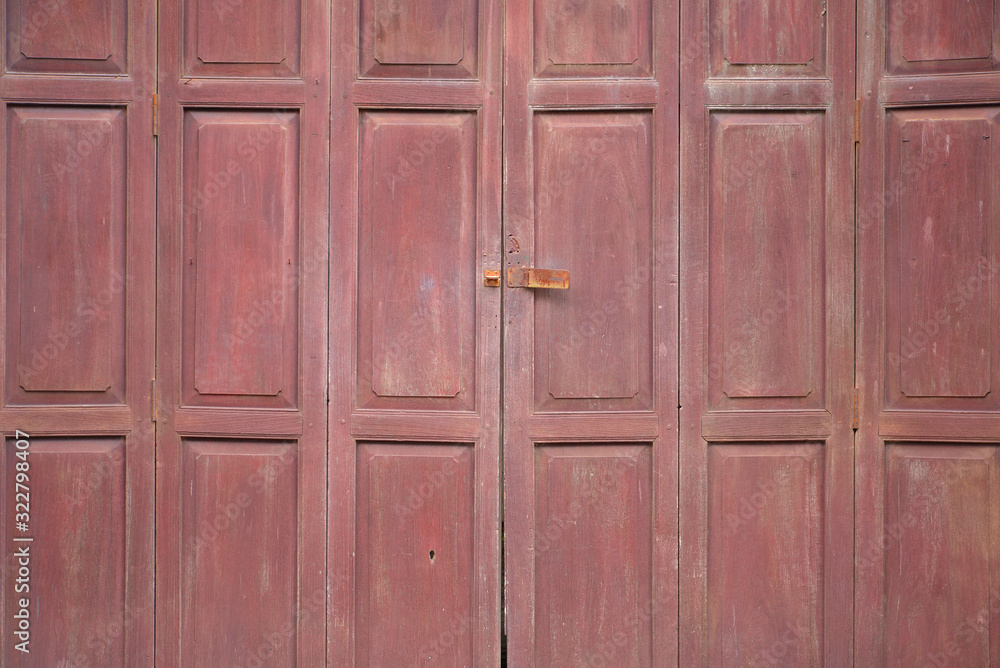 Fototapeta premium Old wooden vintage door painted in brown