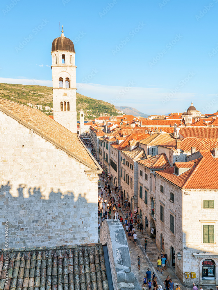 People at Franciscan monastery on Stradun Street in Dubrovnik Croatia