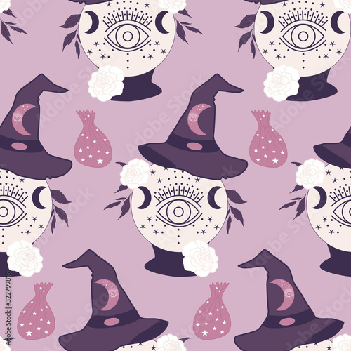 with.  rystal globe and witch hat in a seamless pattern photo