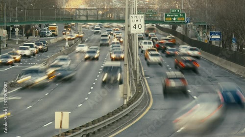 Timelapse of New York highway with car traffic in rush hour and bridge