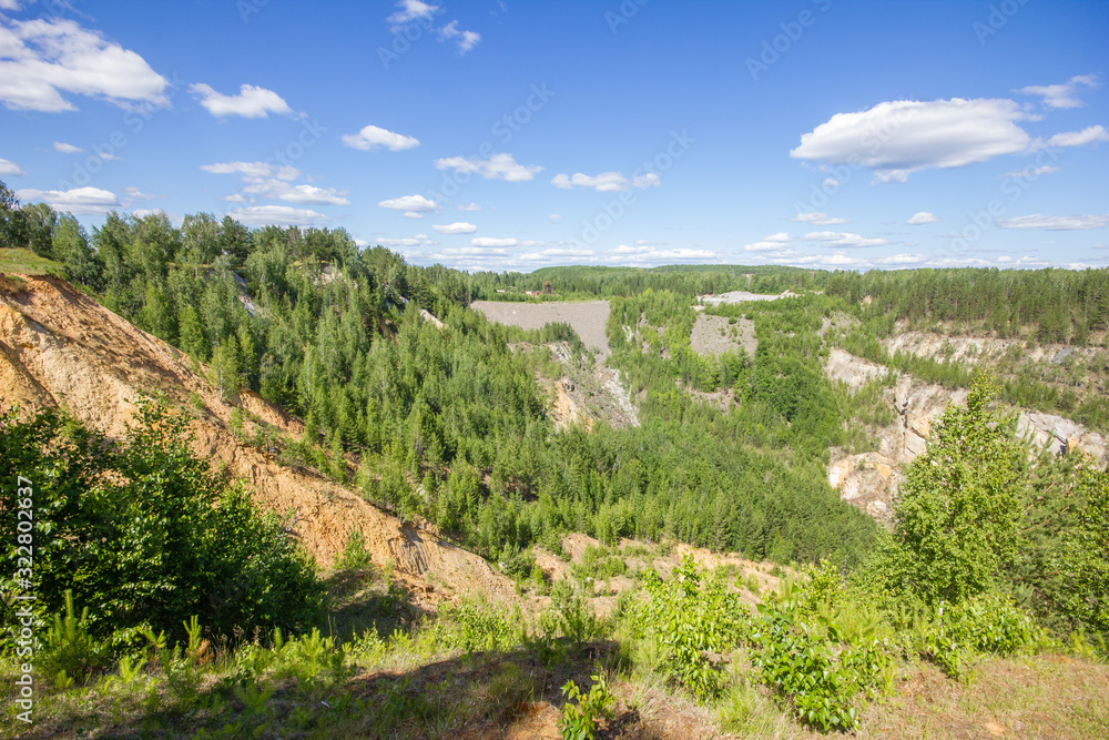 Old emerald ore quarry mining at summer day Old emerald ore quarry mining at summer day