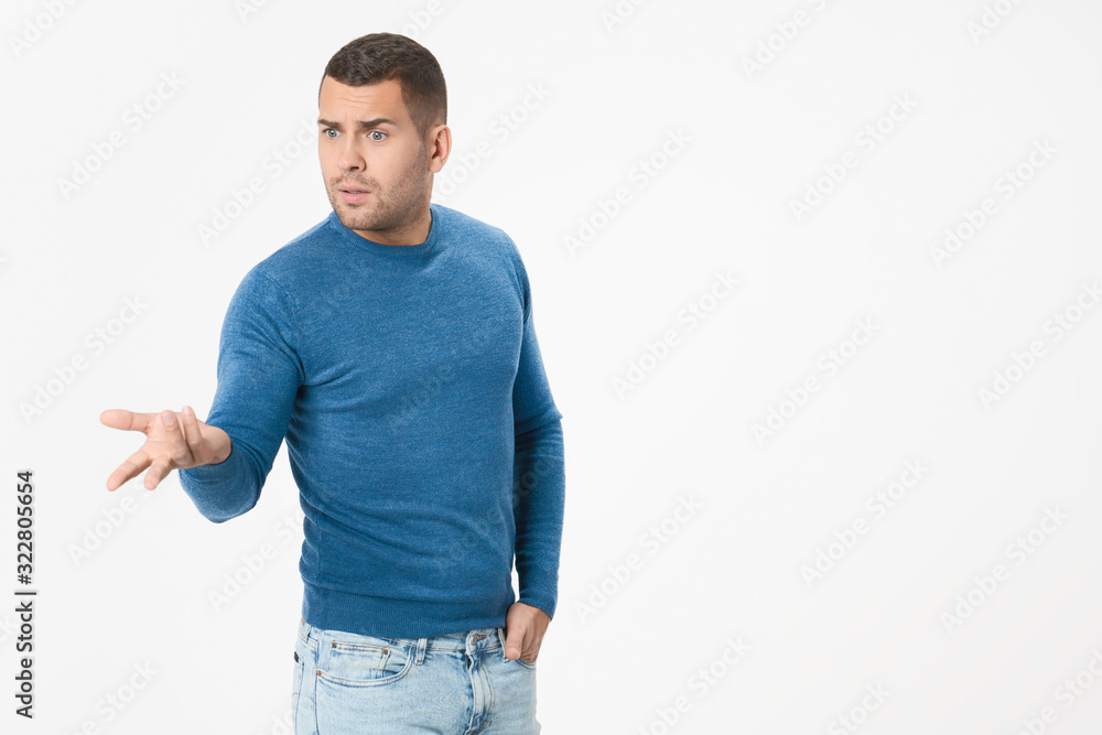 Unhappy young adult man asking what's the problem isolated on white background Unhappy young adult man asking what's the problem isolated on white background