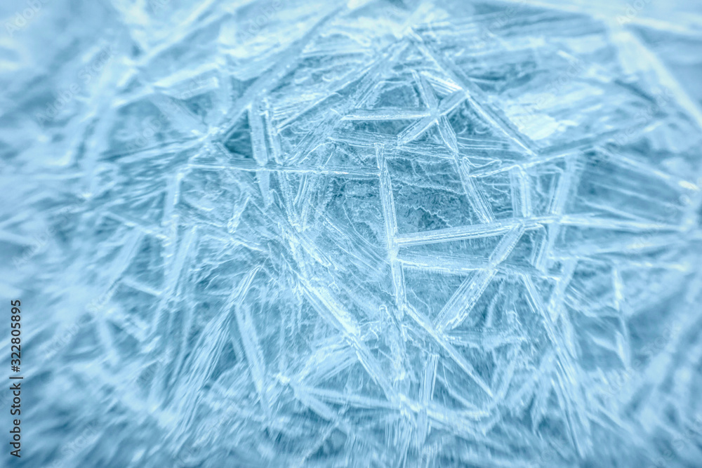 Frozen water. Snowflakes sparkling in the sun Frozen water. Snowflakes sparkling in the sun
