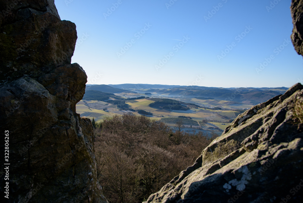 Winter view on valley through rocks