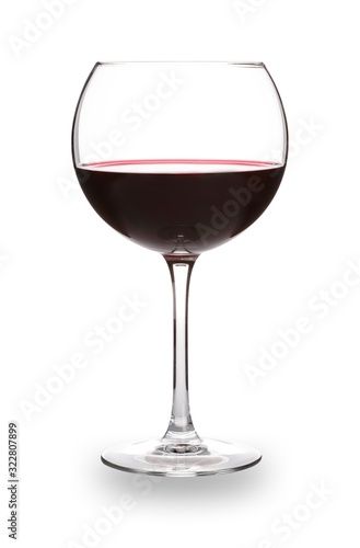 A traditional and elegant bowl shaped glass of red wine, isolated on white