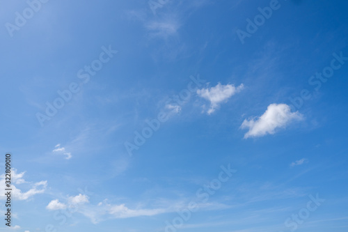 Blue sky with a little white cloud background