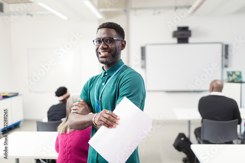 Portrait smiling confident male community college instructor