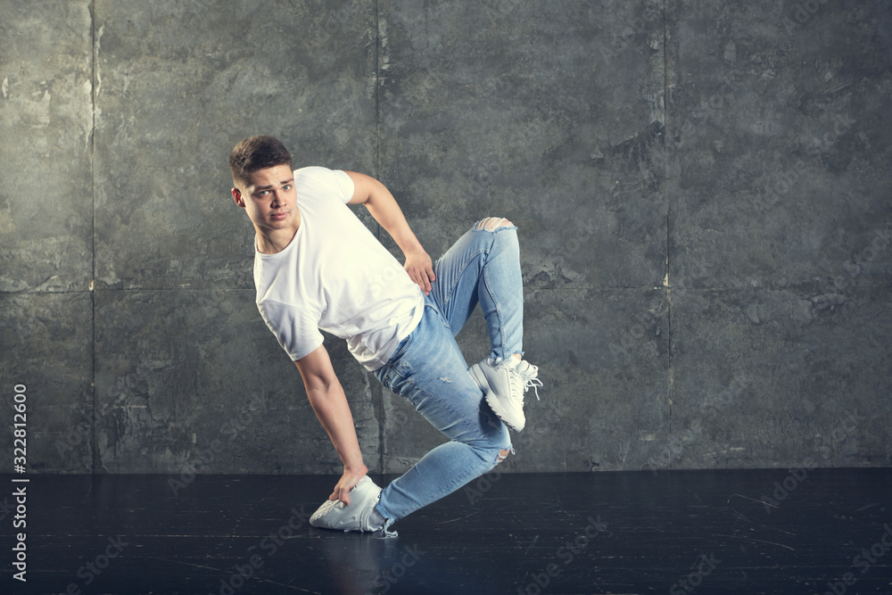 Dancer performing over dark background Dancer performing over dark background