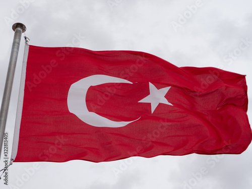 Turkish flag flying at tourist site in Cappadocia, Turkey