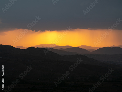 View across Cappadoccia valley from Uchisar Castle during sunset, Turkey