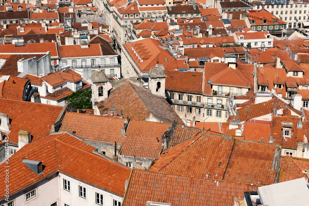Lisbon red tiled roofs of the historic city from above.