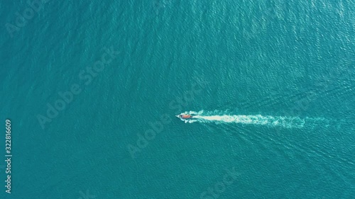 Wallpaper Mural Aerial view of Long Tail Boats floating on crystal water along the sand beach in Thailand.Summer Aerial View footage in 4K. Torontodigital.ca