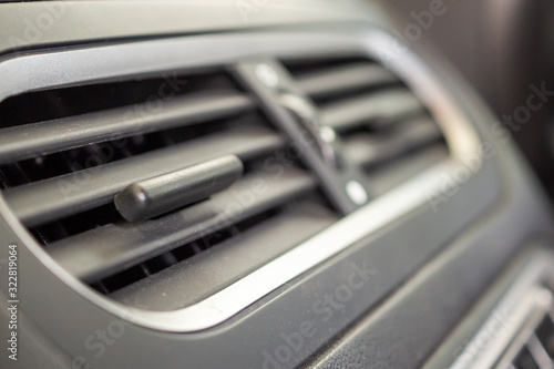 Air conditioner in modern compact car close up