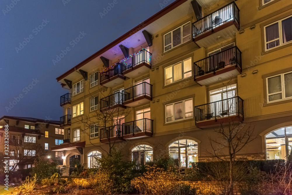 Fragment of luxury building or house at night in Vancouver, Canada.