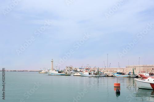 Port area with sailing vessels in the port of Molfetta, Italy