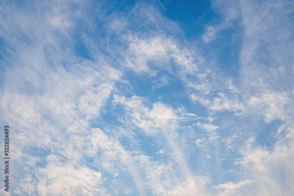 Beautiful blue sky with cirrus clouds. Natural background without focus, empty pattern for copy space Beautiful blue sky with cirrus clouds. Natural background without focus, empty pattern for copy space