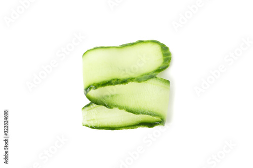 Green cucumber slice isolated on white background