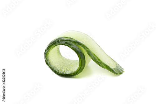 Green cucumber slice isolated on white background