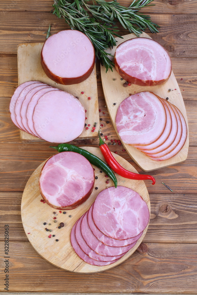 Pork ham on a wooden background