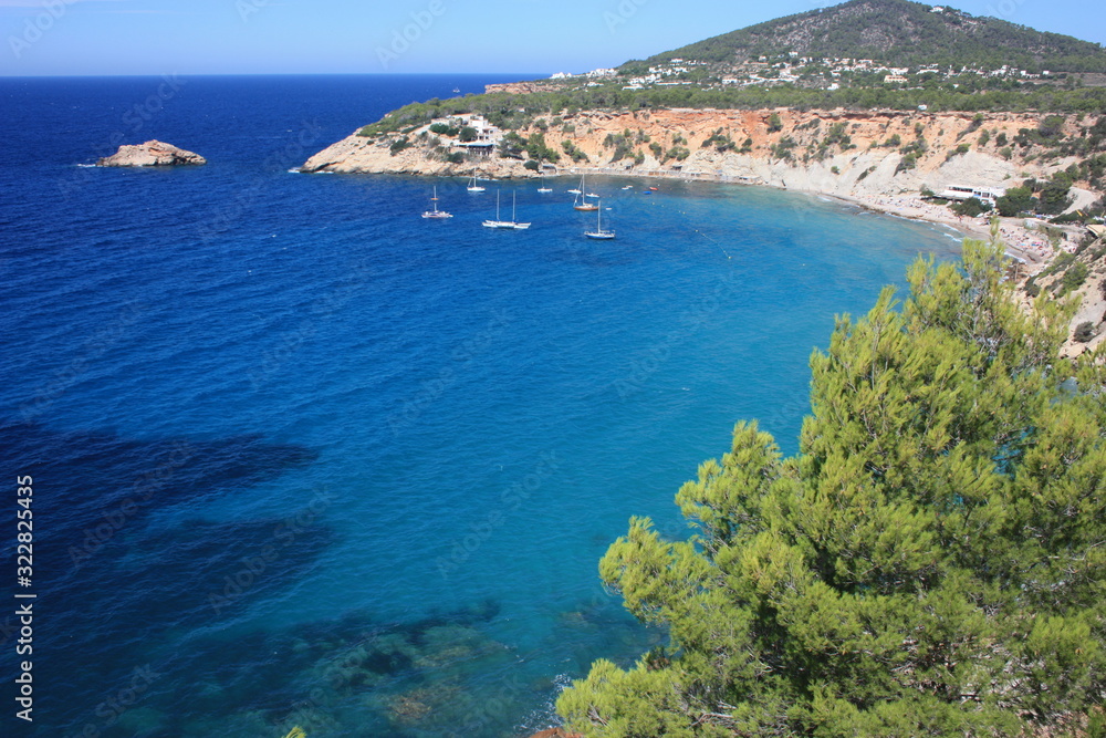 the coast of Ibiza in the Mediterranean sea on a beautiful sunny summer day