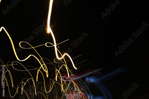Colorful abstract line light art with black background. Conceptual art showing motion, pulse of the city of Helsinki & darkness of the night. Created by moving camera with long exposure.