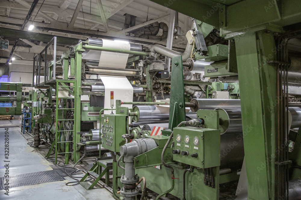 Industrial workshop of the Lambumiz plant. Production of laminated cardboard food packaging. Moscow, Russia Industrial workshop of the Lambumiz plant. Production of laminated cardboard food packaging. Moscow, Russia