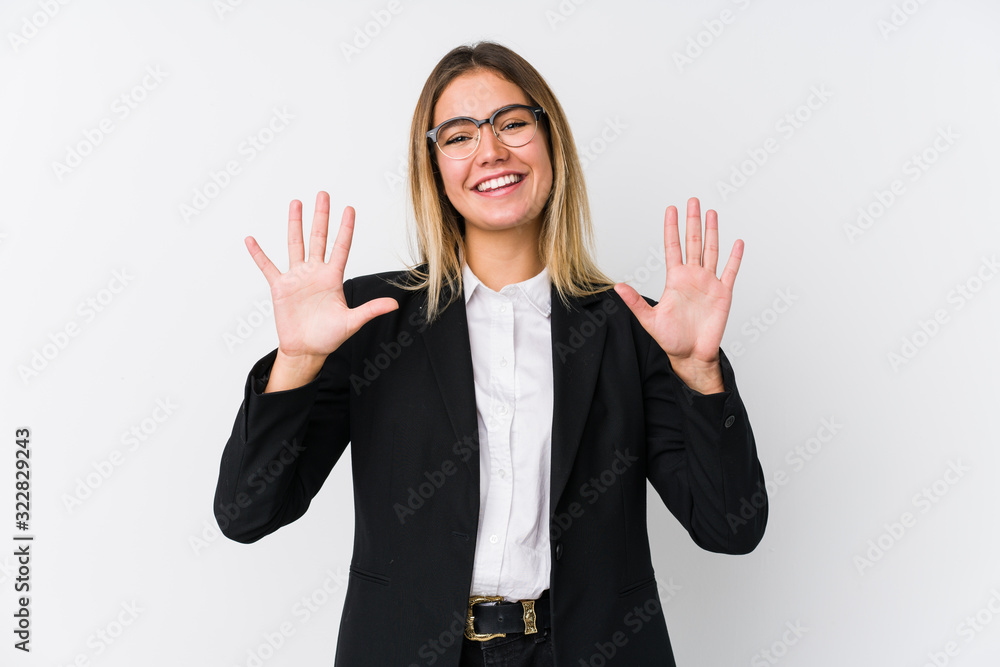 Young business caucasian woman showing number ten with hands. Young business caucasian woman showing number ten with hands.
