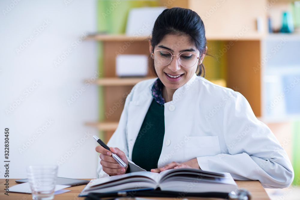 doctor female explaining results in a practice doctor female explaining results in a practice
