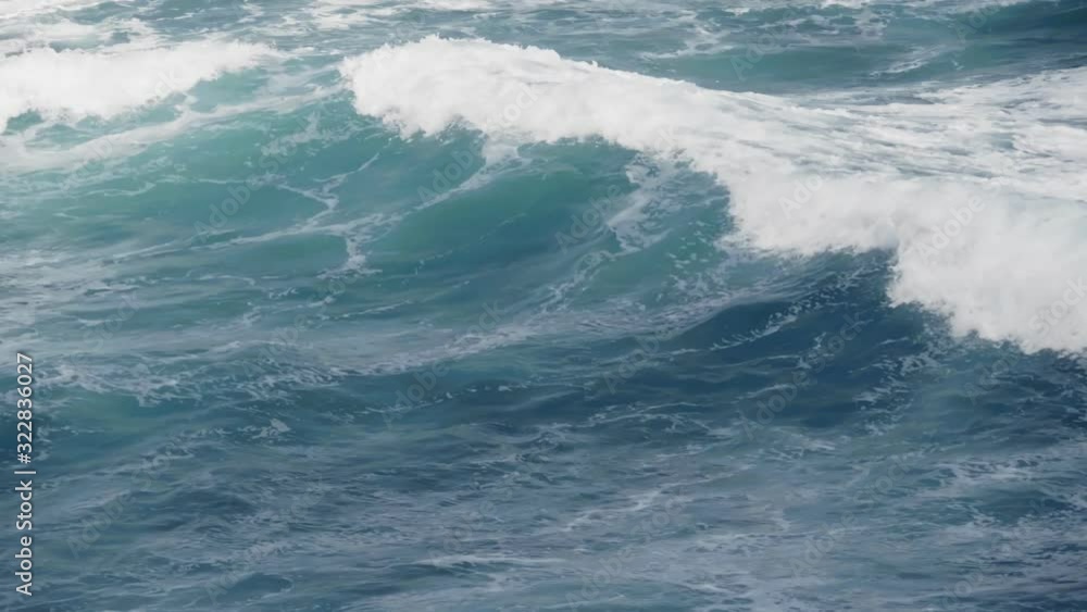 Waves crashing over rocks on a beach in Puerto Rico. Waves crashing over rocks on a beach in Puerto Rico.