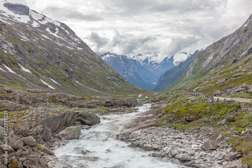 Amazing mountain river in valley in Norway. landscape. Turquoise River. Fast flow mountain River in Norway
