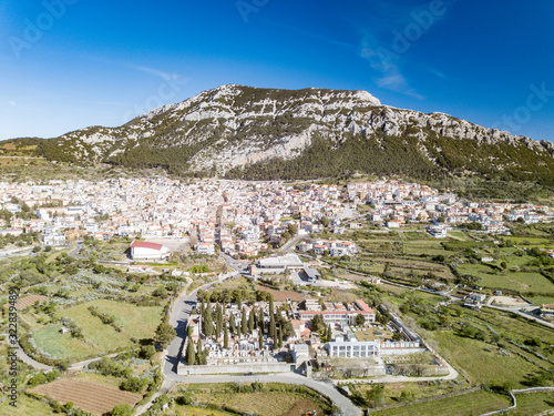 AERIAL VIEW OF THE TOWN OF DORGALI IN THE CENTER OF SARDINIA photo