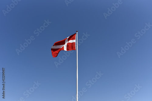 National flag of Denmark on flagpole