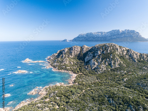 Aerial view of the wonderful bays of Li Cuncheddi, Capo Ceraso, north Sardinia. Crystal clear water and amazing granite rocks