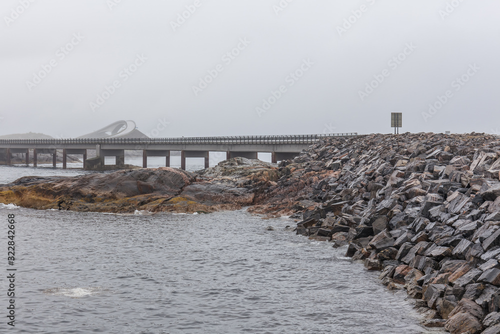 Atlantic road bridge in foggy weather, Atlantic seaside, Picturesque road between island number 64 from city Kristiansund in city Moldi