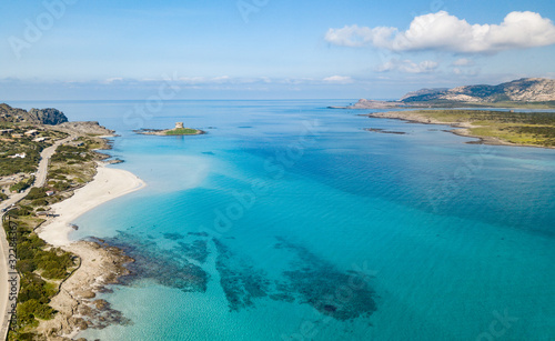 Aerial View of the Beautiful Stintino Beach With tower and The island of Asinara in Background