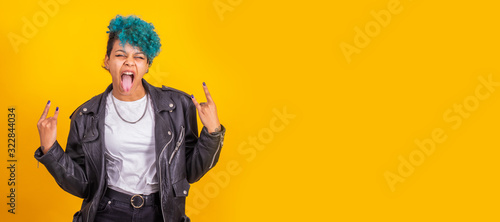 Stampa su tela modern young girl with rebel expression isolated on color background
