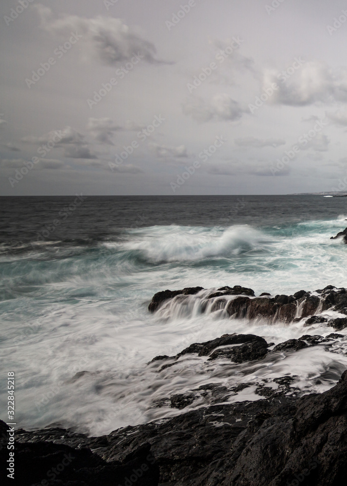 waves crashing rocks on the coast of Sao Miguel, Azores Island