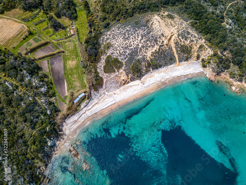 BEAUTIFUL AERIAL VIEW OF THE BEACH OF CALA DI TRANA WITH ITS GOLDEN DUNES photo