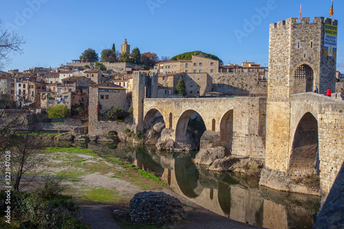 Medieval bridge of Besalu. Catalonia, Spain photo