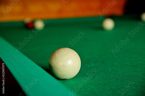 Wallpaper Mural Russian billiards. Numbered ivory balls lay on the green cloth of the bijar table. Gambling for money for adults. Rest after work in a tavern. Production of board games. International sports competiti Torontodigital.ca
