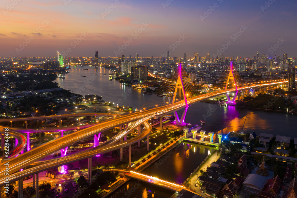 Fototapeta premium Aerial view of Bhumibol bridge in Bangkok district across Chao Phraya river in Thailand