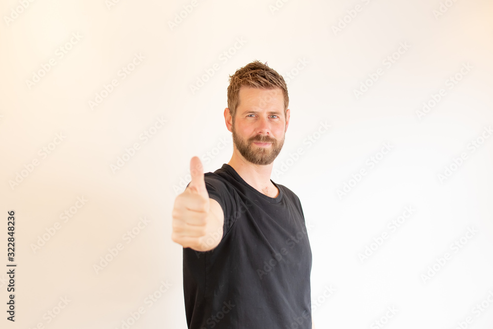 Young man with a thumbs up Young man with a thumbs up